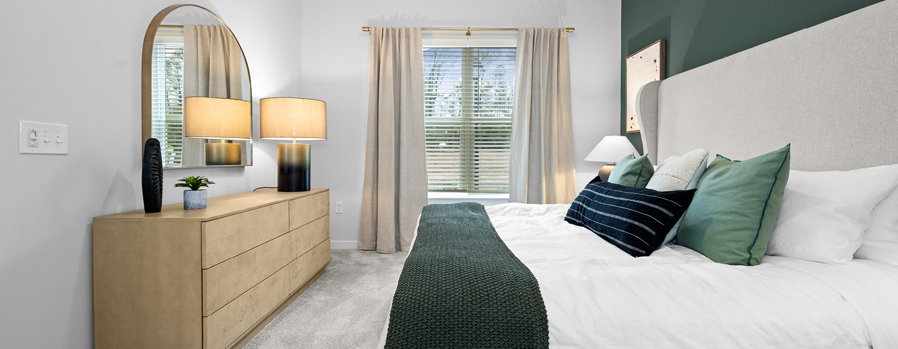 Bedroom with natural lighting and high ceilings